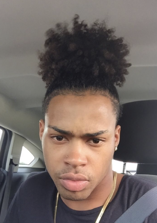 Men's high puff curly hairstyle