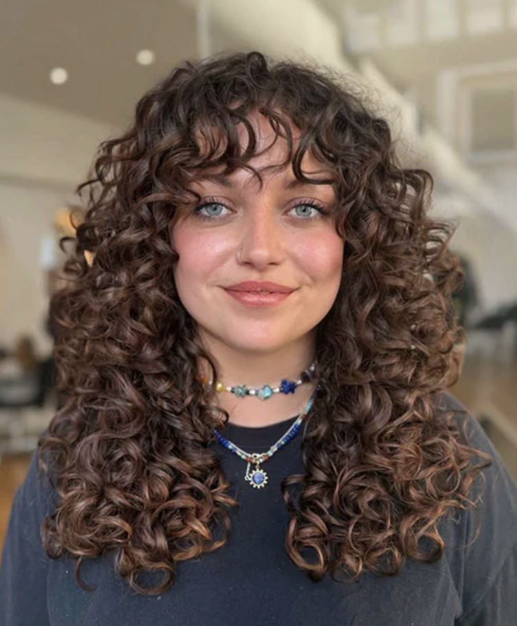 Curly bangs hairstyle for women